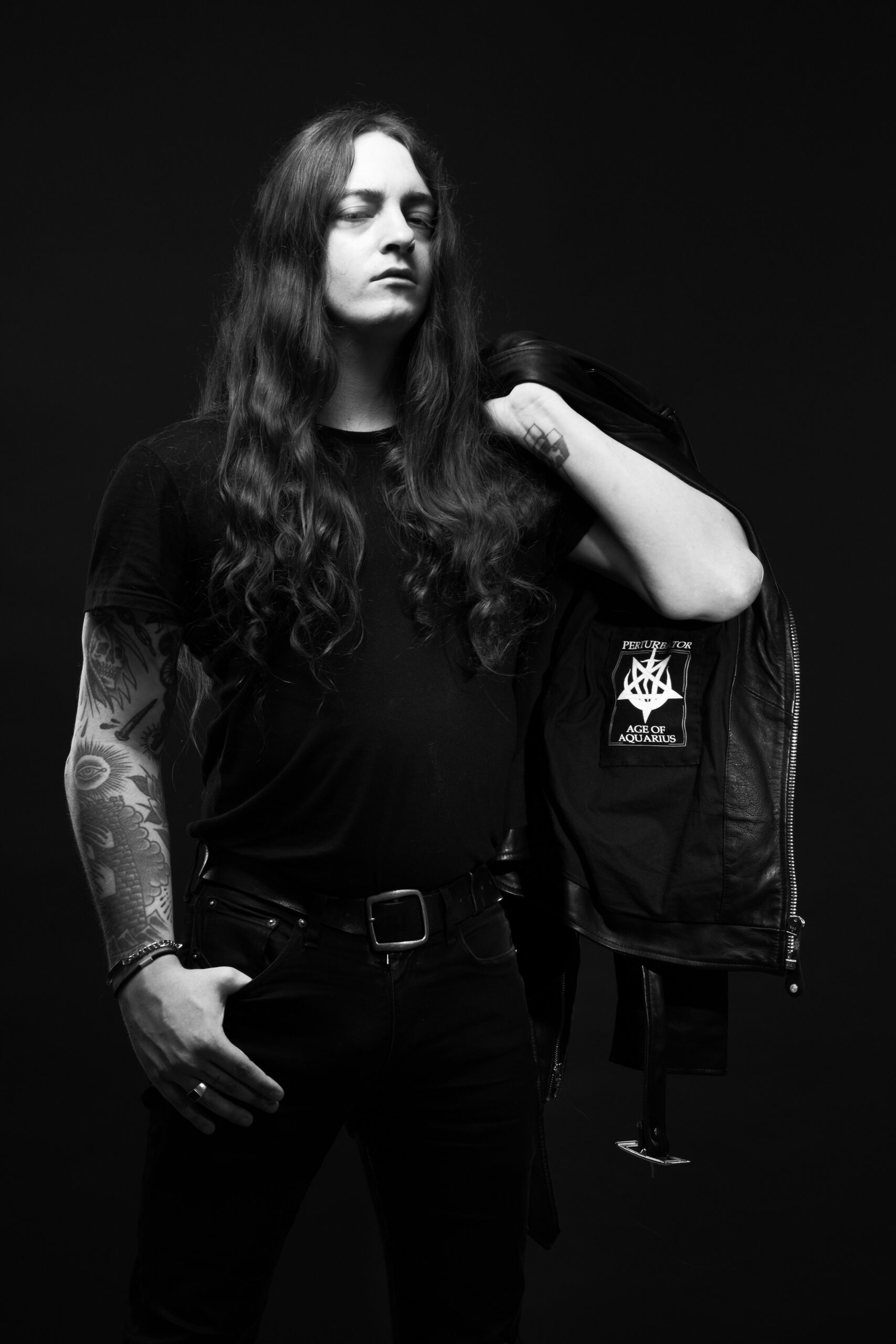 Perturbator wearing the custom Schott Perfecto created for the campaign.